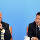China's Vice President Xi Jinping (R) speaks next to U.S. Vice President Joe Biden during a discussion with U.S. and Chinese business leaders at Beijing Hotel in Beijing August 19, 2011.